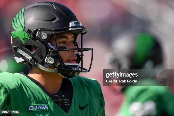 Mason Fine of the North Texas Mean Green looks on during the Conference USA Championship game against the Florida Atlantic Owls at FAU Stadium on...