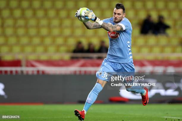 Angers' French goalkeeper Alexandre Letellier grabs the ball during the French L1 football match Monaco vs Angers on December 2, 2017 at the Louis II...