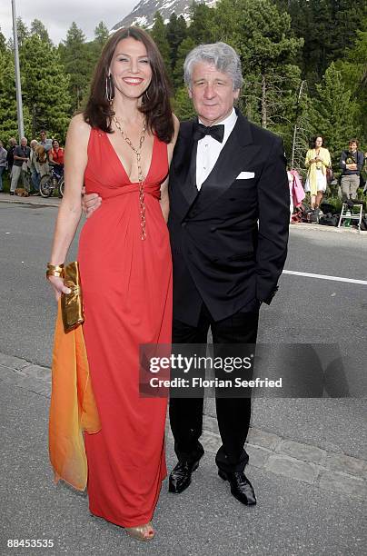 Marcel Reif and girlfriend Marion Kiechle arrive for the church wedding of Boris Becker and Sharlely Kerssenberg at the Regina Pacis Chapel on June...