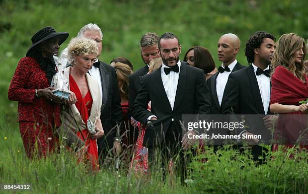 Esseline Kerssenberg-Bradley , grandmother of Sharlely Kerssenberg, Sabine Becker-Schorp and guests depart after attending the church wedding of...