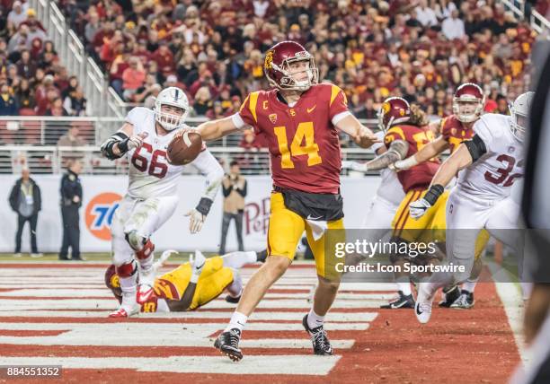 Trojans quarterback Sam Darnold scrambles in the endzone to get a pass down field for a 1st down during the PAC-12 Championship game between the USC...