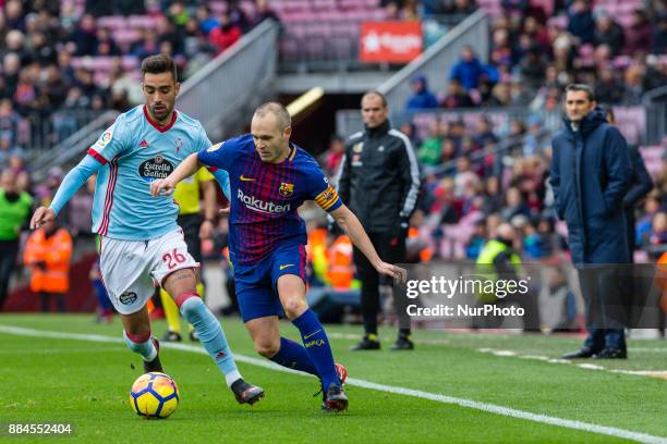 Barcelona midfielder Andres Iniesta and Celta de Vigo forward Brais Mendez during the match between FC Barcelona vs Celta de Vigo, for the round 14...