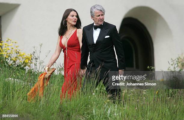 Sports television presenter Marcel Reif and his wife Marion Kiechle attend the church wedding of former tennis star Boris Becker to Sharlely...