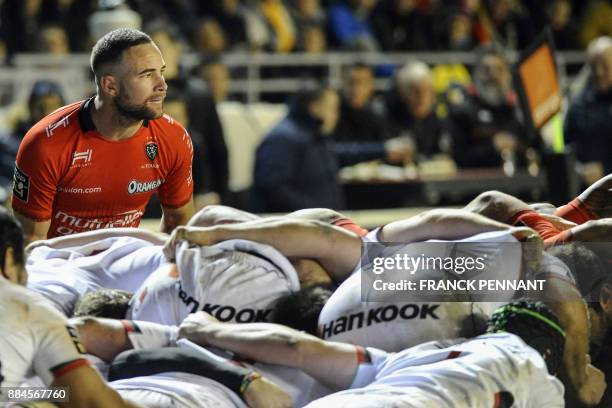 Toulons New Zealand scrum half Alby Mathewson prepares to throw the ball in the scrum during the French Top 14 rugby union match between RC Toulon...
