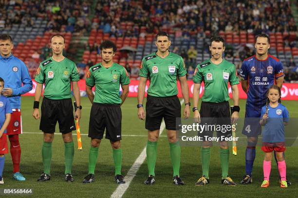 Referees L-R Andrej Giev Adrian Arndt Shaun Evans and Ryan Gallagher line up before the start of play during the round nine A-League match between...