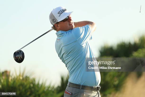Charley Hoffman of the United States plays his shot from the 15th tee during the third round of the Hero World Challenge at Albany, Bahamas on...