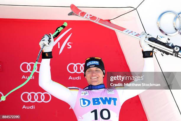 Thomas Dressen of Germany celebrates his third place finish on the medals podium after the Men's Downhill during the Audi Birds of Prey World Cup on...