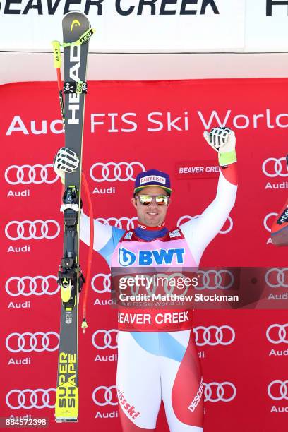 Beat Feuz of Switzerland celebrates his second place finish on the medals podium after the Men's Downhill during the Audi Birds of Prey World Cup on...