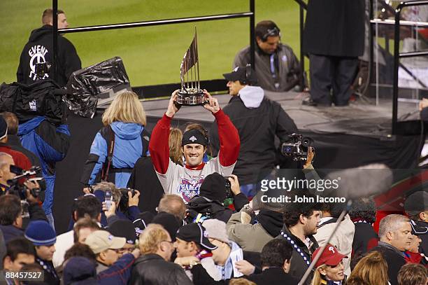 World Series: Philadelphia Phillies Cole Hamels victorious with WS MVP trophy after game vs Tampa Bay Rays. Game 5 concluded on Wednesday two days...