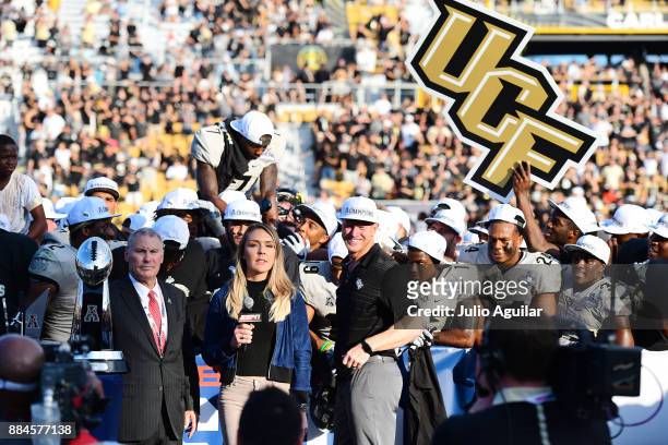 Head coach Scott Frost of the UCF Knights celebrates after winning the ACC Championship 62-55 against the Memphis Tigers at Spectrum Stadium on...