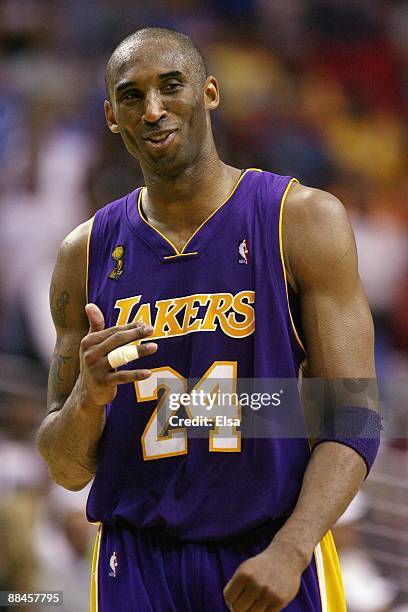 Kobe Bryant of the Los Angeles Lakers looks on with a smile in Game Four of the 2009 NBA Finals against the Orlando Magic at Amway Arena on June 11,...