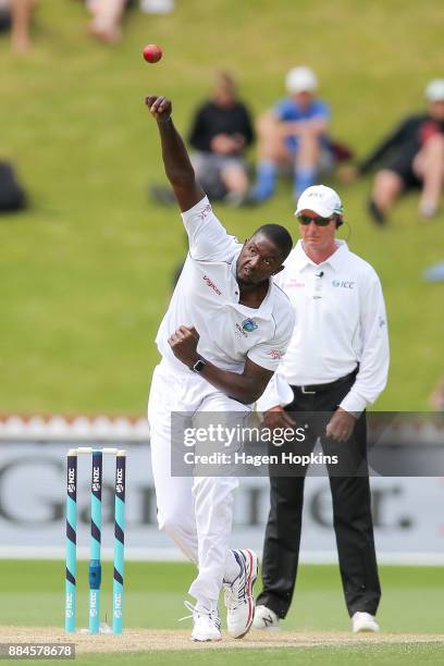 Jason Holder of the West Indies bowls during day three of the Test match series between New Zealand Blackcaps and the West Indies at Basin Reserve on...