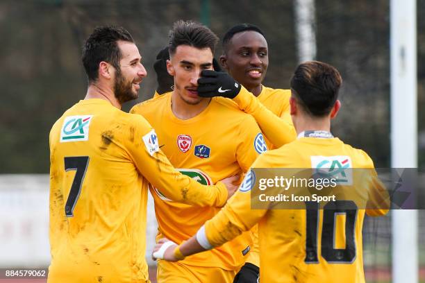 Antony Robic, Yanis Barka and Modou Diagne of Nancy celebrate during the French Cup match between Rungis and Nancy on December 2, 2017 in...
