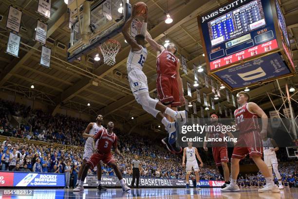 Tyler Hagedorn of the South Dakota Coyotes defends a shot by Javin DeLaurier of the Duke Blue Devils at Cameron Indoor Stadium on December 2, 2017 in...