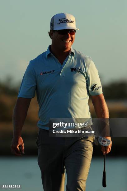 Charley Hoffman of the United States reacts on the 17th green during the third round of the Hero World Challenge at Albany, Bahamas on December 2,...