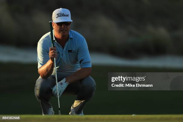 Charley Hoffman of the United States prepares to play a shot on the 17th hole during the third round of the Hero World Challenge at Albany, Bahamas...