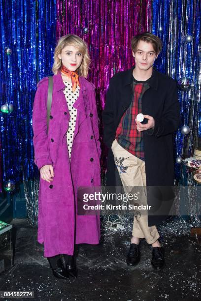Natalia Dyer and Charlie Heaton attends the Burberry x Cara Delevingne Christmas Party on December 2, 2017 in London, England.