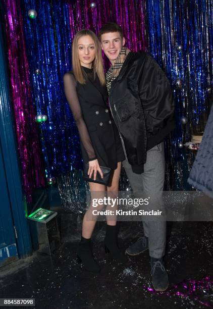 Hebe Flury and Tom Heyes attend the Burberry x Cara Delevingne Christmas Party on December 2, 2017 in London, England.