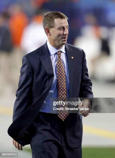 Head coach Dabo Swinney of the Clemson Tigers walks the field before their game against the Miami Hurricanes at the ACC Football Championship at Bank...