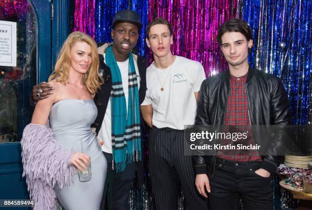 Guest, Jamal Edwards Harris Dickinson, Jack Brett Anderson attends the Burberry x Cara Delevingne Christmas Party on December 2, 2017 in London,...