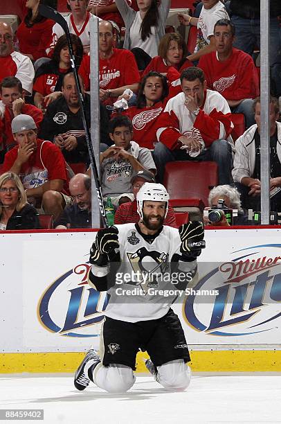 Maxime Talbot of the Pittsburgh Penguins celebrates his second goal against the Detroit Red Wings during Game Seven of the 2009 Stanley Cup Finals at...