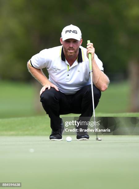 Adam Bland of Australia lines up a putt during day four of the 2017 Australian PGA Championship at Royal Pines Resort on December 3, 2017 in Gold...