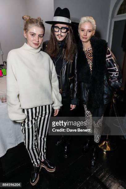 Cali White, Joshua Kane and Alice Pins attend a special live acoustic performance by The Vamps at the Joshua Kane London Flagship Store on December...