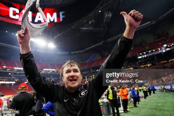 Head coach Kirby Smart of the Georgia Bulldogs celebrates beating the Auburn Tigers in the SEC Championship at Mercedes-Benz Stadium on December 2,...