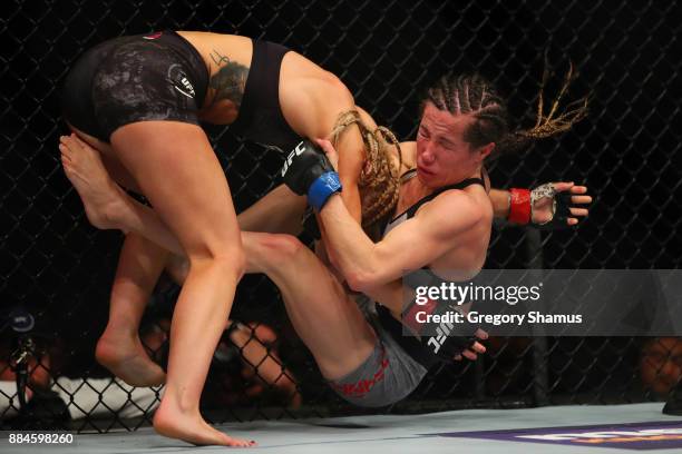 Amanda Cooper takes down Angela Magana during UFC 218 at Little Ceasers Arena on December 2, 2018 in Detroit, Michigan.