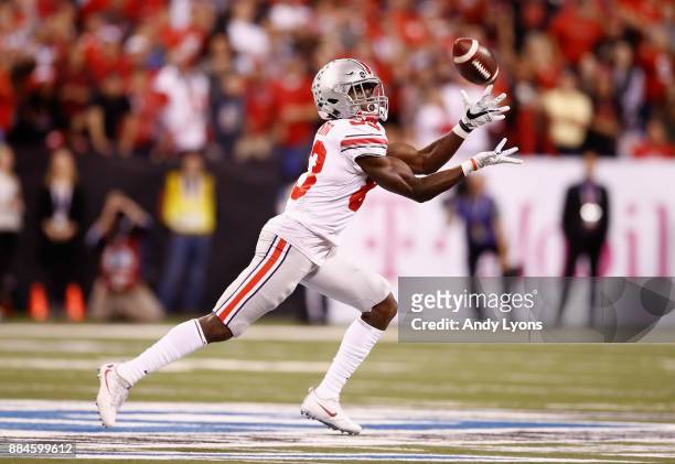 Wide receiver Terry McLaurin of the Ohio State Buckeyes makes the catch and runs it in for a touchdown during the Big Ten Championship game at Lucas...