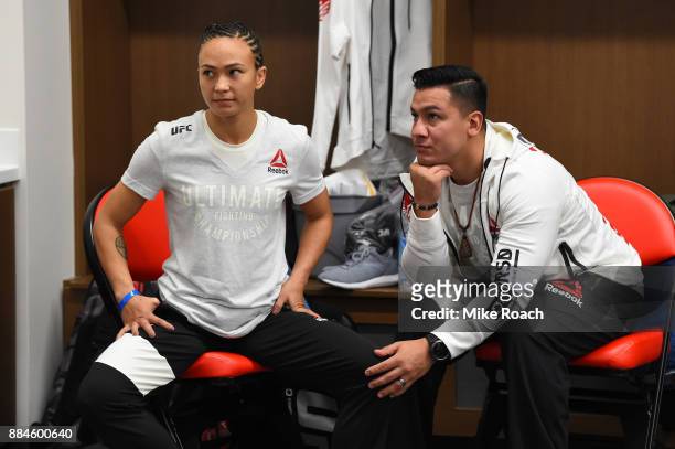 Michelle Waterson waits with her husband Joshua Gomez backstage during the UFC 218 event inside Little Caesars Arena on December 02, 2017 in Detroit,...