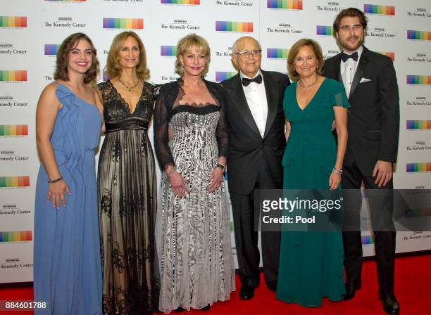 Norman Lear and his family arrive for the formal Artist's Dinner honoring the recipients of the 40th Annual Kennedy Center Honors hosted by United...