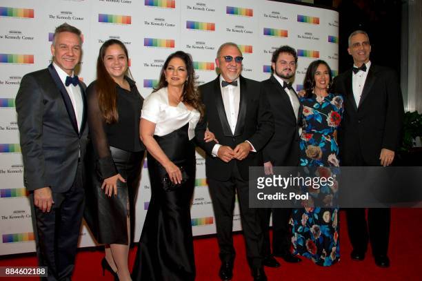 Gloria Estefan, her husband, Emilio, and their family, arrive for the formal Artist's Dinner honoring the recipients of the 40th Annual Kennedy...