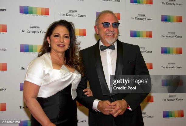 Gloria Estefan and her husband, Emilio, arrive for the formal Artist's Dinner honoring the recipients of the 40th Annual Kennedy Center Honors hosted...