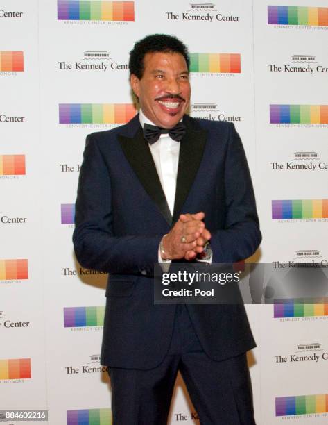 Lionel Richie arrives for the formal Artist's Dinner honoring the recipients of the 40th Annual Kennedy Center Honors hosted by United States...