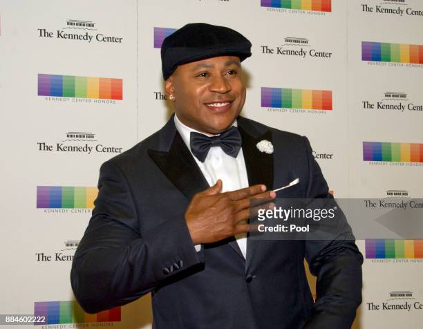 Cool J arrives for the formal Artist's Dinner honoring the recipients of the 40th Annual Kennedy Center Honors hosted by United States Secretary of...