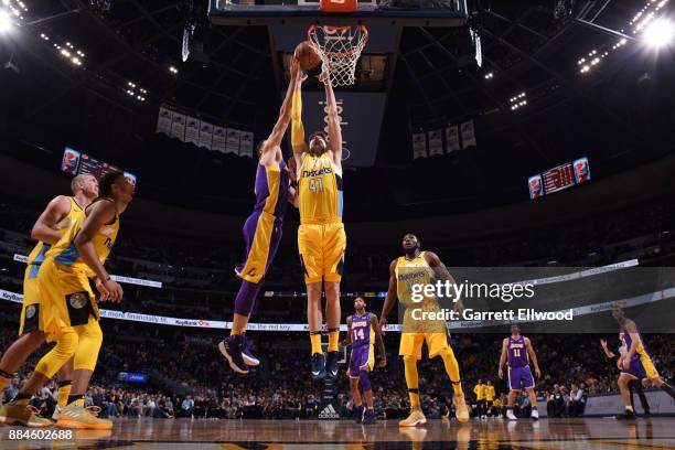 Juan Hernangomez of the Denver Nuggets goes up for a rebound against the Los Angeles Lakers on December 2, 2017 at the Pepsi Center in Denver,...