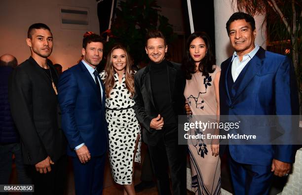 Actor Martin Sensmeier, writer/director Taylor Sheridan, actors Elizabeth Olsen, Jeremy Renner, Kelsey Asbille, and Gil Birmingham attend a cocktail...