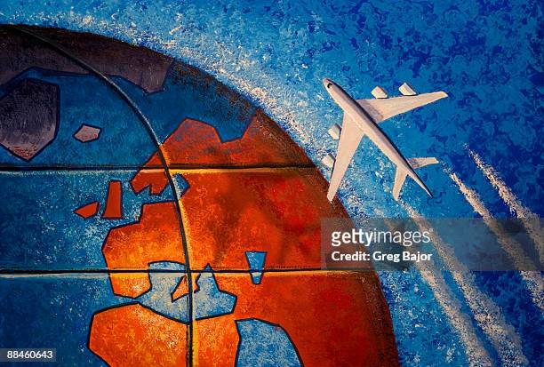 commercial plane flying over globe - greg bajor stock-grafiken, -clipart, -cartoons und -symbole