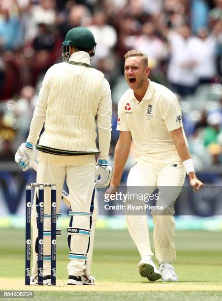 Stuart Broad of England celebrates after taking the wicket of Peter Handscomb of Australia during day two of the Second Test match during the 2017/18...