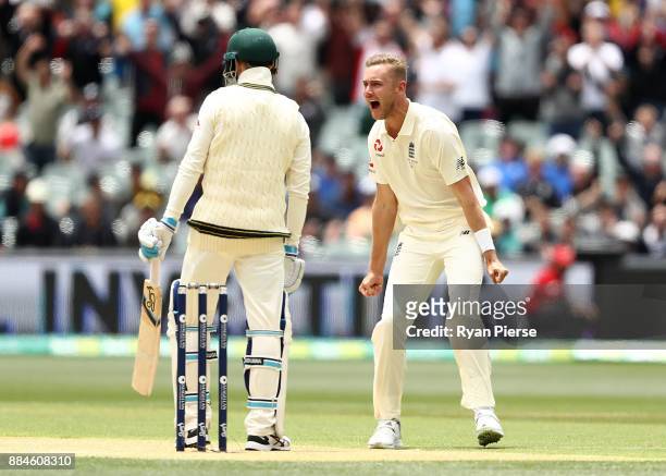 Stuart Broad of England celebrates after taking the wicket of Peter Handscomb of Australia during day two of the Second Test match during the 2017/18...