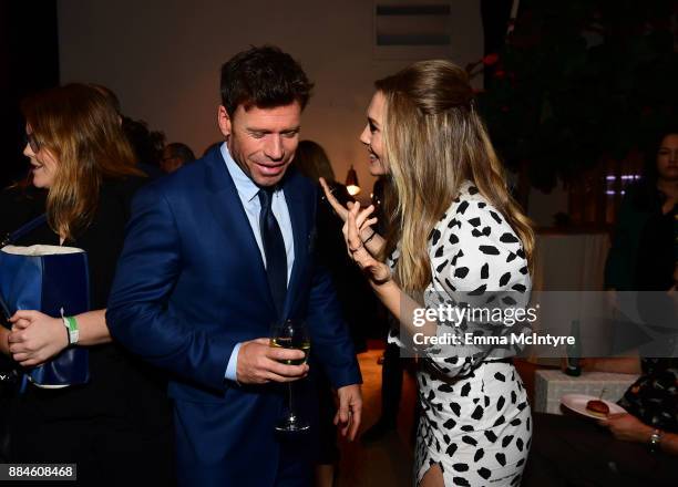 Writer/director Taylor Sheridan and actor Elizabeth Olsen attend a cocktail party for "Wind River" at Circa 55 Restaurant on December 2, 2017 in Los...