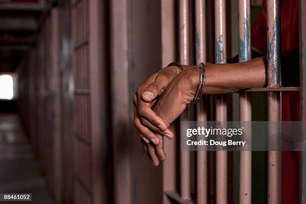 african american in prison - manette foto e immagini stock