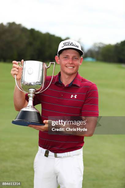 Cameron Smith holds the Kirkwood Cup after winning on day four of the 2017 Australian PGA Championship at Royal Pines Resort on December 3, 2017 in...