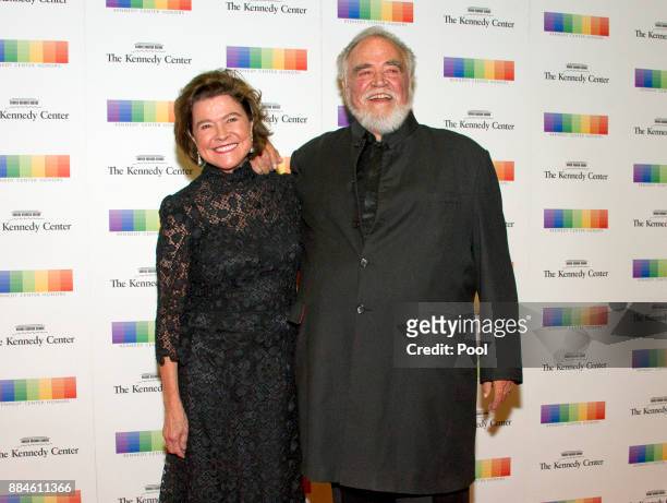 Herbert V. Kohler and his wife, Natalie Black, arrive for the formal Artist's Dinner honoring the recipients of the 40th Annual Kennedy Center Honors...