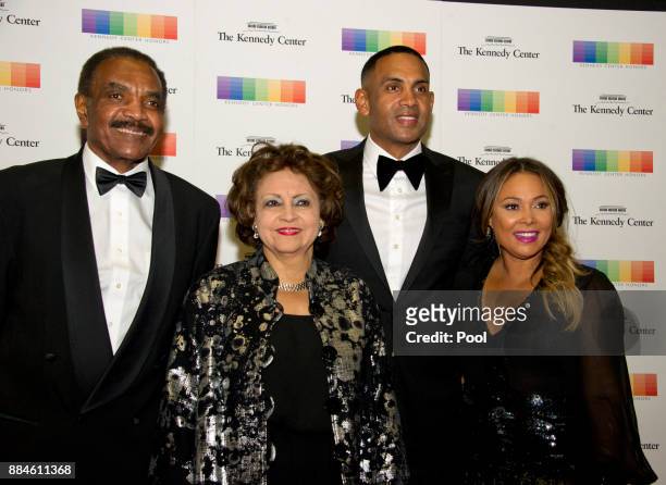 From left to right: Calvin Hill, wife Janet, Grant Hill and wife Tamia, arrive for the formal Artist's Dinner honoring the recipients of the 40th...