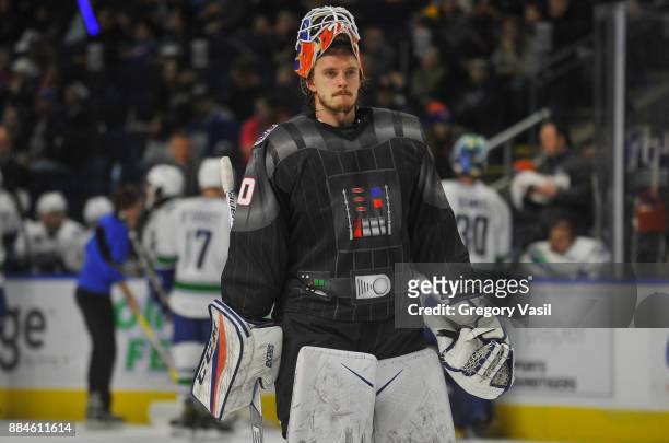 Kristers Gudlevskis of the Bridgeport Sound Tigers skates onto the ice during a game against the Utica Comets at the Webster Bank Arena on December...