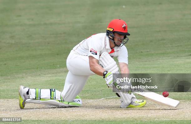 Jake Lehmann of the Redbacks bats during day one of the Sheffield Shield match between Queensland and South Australia at Cazaly's Stadium on December...