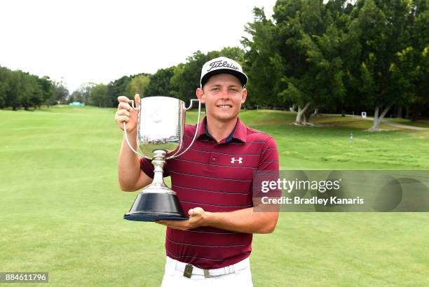 Cameron Smith of Australia celebrates victory as he holds up the Kirkwood Cup during day four of the 2017 Australian PGA Championship at Royal Pines...