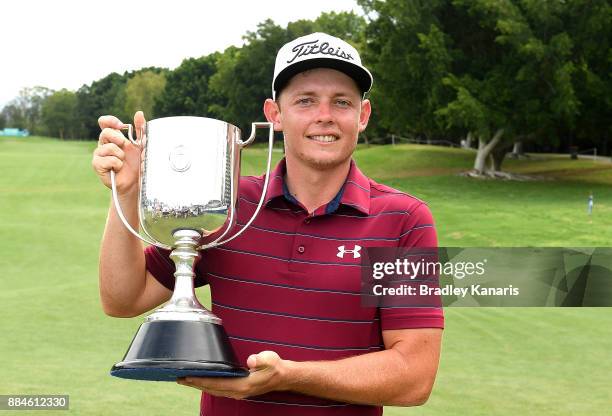 Cameron Smith of Australia celebrates victory as he holds up the Kirkwood Cup during day four of the 2017 Australian PGA Championship at Royal Pines...